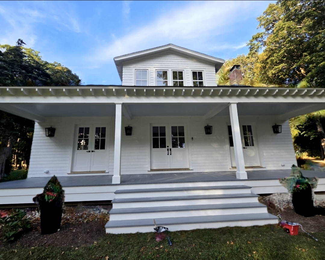 Beautiful suburban home exterior painted navy blue